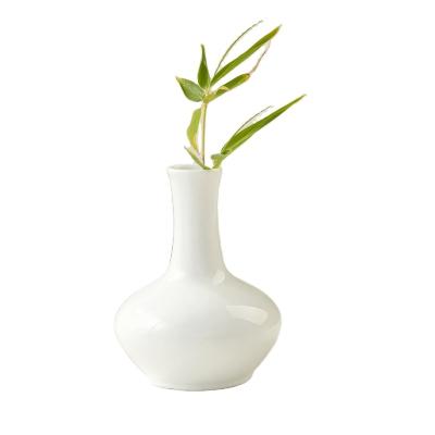 China MERLIN Home Decoration White Nordic Modern Design Auratic Europe Style Tabletop Ceramic Flower Vases for sale