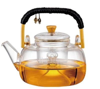 China Sustainable Tea Cooker Thickened Steam Teapot Beam Pot Boiling Water Set High Temperature Resistant Glass Teapot for sale