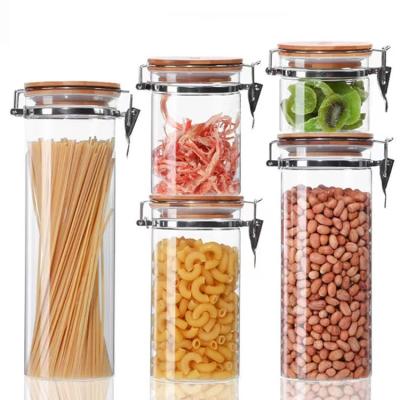 China Heatable Transparent High Borosilicate Glass Storage Jar With Lid Metal Clasp Grain Sealed for sale