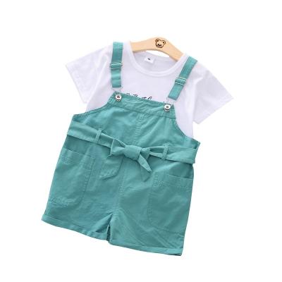 China Casual made in China factory direct sales cute little girl two-piece skirt solid color suspender short-sleeved skirt suit for sale