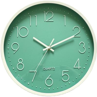 China Minimalist plastic round quartz gift 12 inch modern creative contracted wall clock cheap luminous color wall clock for sale