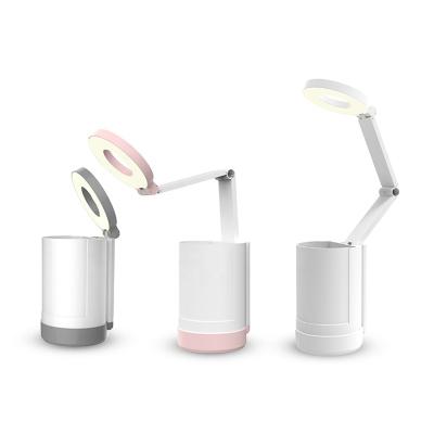 China Modern Eye Care Style LED Desk Lamp Battery Table Lamp Folding Desk Lamp with Pen Holder Phone Stand Te koop