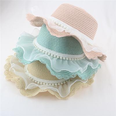 China Spring Summer Striped Hot-selling Lace With Pearl Round Straw Hat 52cm Sun Protection Kids Straw Hat for sale