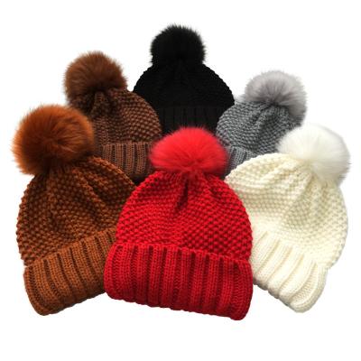 China Fashion JOINT Women's Jacquard Thicken Autumn Knitted Beanie Hat With Detachable Fur Pom Pom Winter Outdoor Warm Cap for sale