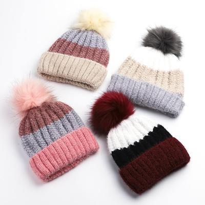 China COMMON Wholesale Acrylic Winter Pom Pom Hat For Women Outdoor Knitted Beanie Hat Faux Fur Pompom Ball for sale