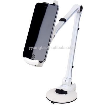 China New Design Instruments Portable Folding Mobile Phone Holder and Magnetic Charger Mobile Phone Stand for sale