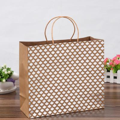 China Recyclable Fancy Twisted Handle Apparel Kraft Paper Shopping Bags With Silver Foil Stamping Logo for sale