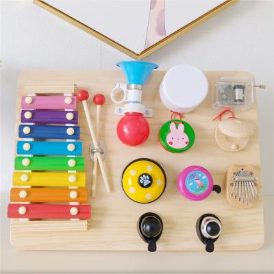 China Eco-Friendly Material Children Multifunctional Bells Trumpet Toy DIY Musical Accessories Busy Board Montessori for sale