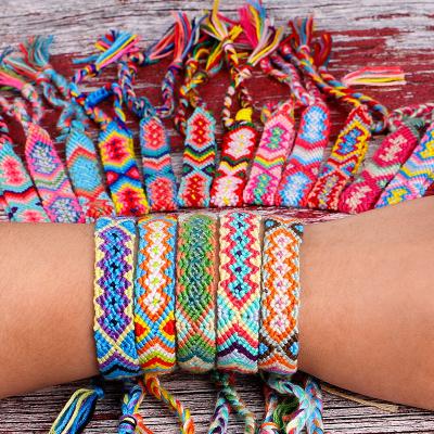 China National ethnic fashion wind flowers fringed elastic hand-woven rope mixed color bracelet jewelry for sale