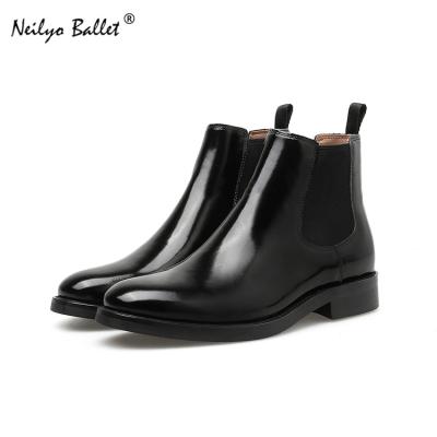 China Anti-Smell Slip On Genuine Leather Women Chelsea Boots Solid Black Rivets Winter Boots Low Block Heel Ankle Boots for sale