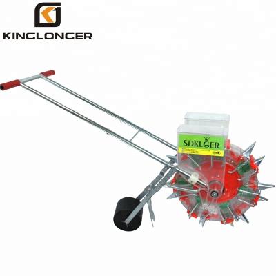 China Manual Corn Hand Push Seeder Fertilizer Machine for sale