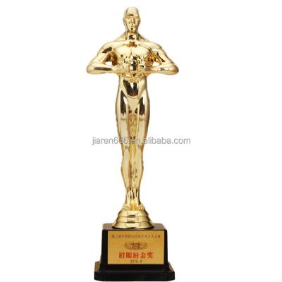 China Oscar Plastic Statuette Plastic Trophy Angel Wings Plated Company Celebration Business Trophy Statuette for sale