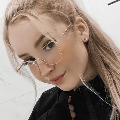 China 2022 New Arrivals Fashion Cat Eye Metal Glass DL Glass Eyewear Fashionable Anti-blue Light Shades Ladies Optical Eyewear for sale