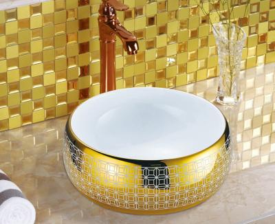 China Gold Bathroom Art Sink Toiletries Gold Plating Ceramic Wash Basin Above Counter Basin Art Round Wash Basin for sale