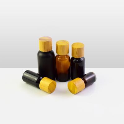 China Gift & Craft Amber Glass Bottle Bamboo Wood Dropper Bottle Essential Oil Glass Bottle for sale