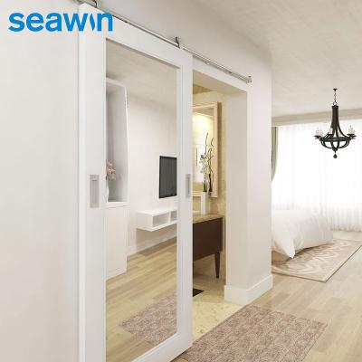 China High Quality Single Frame Sliding Solid White Wooden Barn Doors Windproof With Rollers for sale