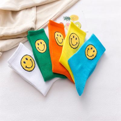 China Solid Color Smile Pattern Antibacterial Running Colorful Cute 100% Cotton Crew Dress Socks Unisex Crew Socks for sale