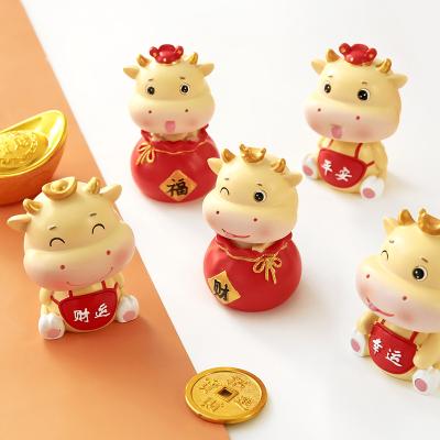 China 2021resin cartoon toy ornaments safe cute doll zodiac cow doll safe toy for sale