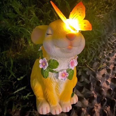 China Custom Europe Outdoor Garden Decoration Cute Life Size Resin Rabbit Statue With Solar Light Butterfly for sale