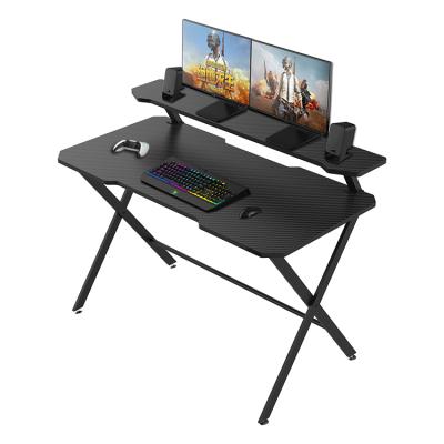 China Ergonomic Expandable Computer Gaming Table With Monitor Stand E-sports Gamer Desk Black PC Gaming Desk With Monitor Shelf for sale