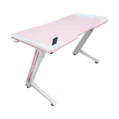 China Expandable white pink gaming desk with wireless charger pc gamer desks led light esports table for sale