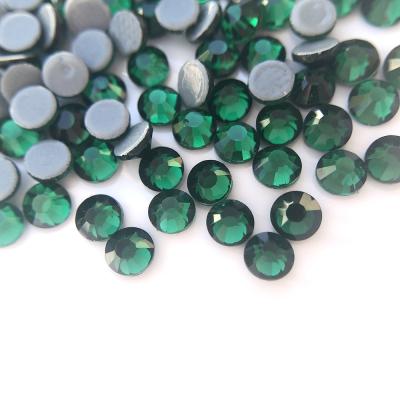 China Flatback round shape glass green dmc hot fix clothing stone rhinestone for decoration for sale