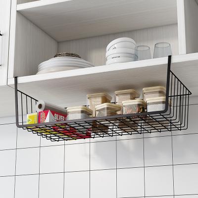 China Minimalist Supplies Shelf Kitchen Hanging Basket Under Cabinet No Hook Storage Shelf Dormitory Storage Punch Shelf for sale