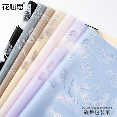 China Eco-Friendly Flower Waterproof Wholesale Paper Waterproof Gift Pattern Butterfly Wrapping Paper Fresh Flower Wrapping Paper for sale