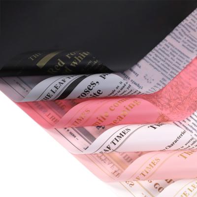 China 20 Sheets Vintage Waterproof Colorful Newspaper Bouquet Gift Shop Plastic Thickened Wrapping Paper for sale