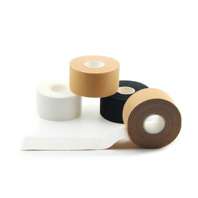 China Easy Tear Strong Viscosity Black Athletic Tape For Sports Athletes As First Aid Injury Wrap Fingers Ankles Wrist Rigid Strapping Tape for sale