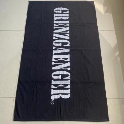 China 100% cotton jacquard bath towel custom logo velour woven jacquard beach towel for sale