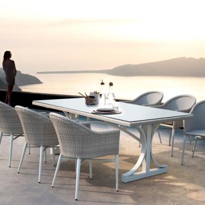 China Modern Factory New Design Rattan Table And Chairs Outdoor Dining Set Wholesale for sale