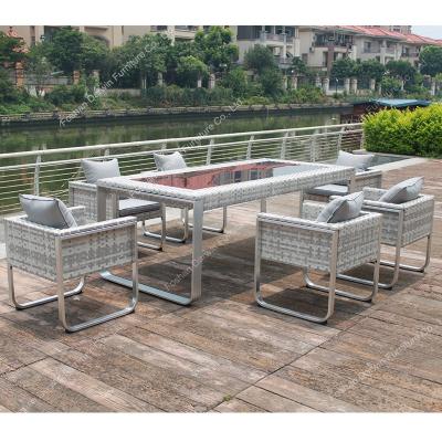 China Modern Furniture Design Luxury Modern Outdoor Garden Chairs And Table Set Outdoor Rattan Dining Set for sale