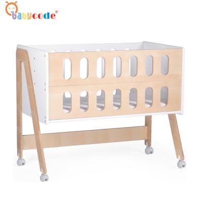 China New Modern Multifunctional Beech Wood Crib Baby Hutch /baby Cradle for sale