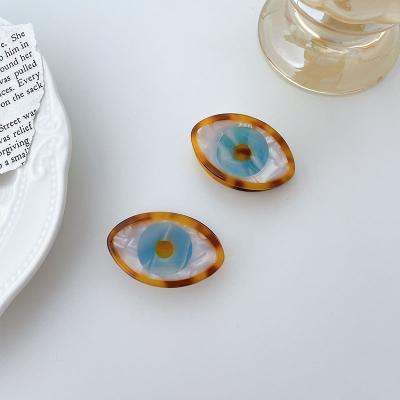 China Easy Custom Fashion Acetate Hair Claw INS Evil Eye Hair Accessories Cute Evil Eye Hair Clip 3.8cm for sale