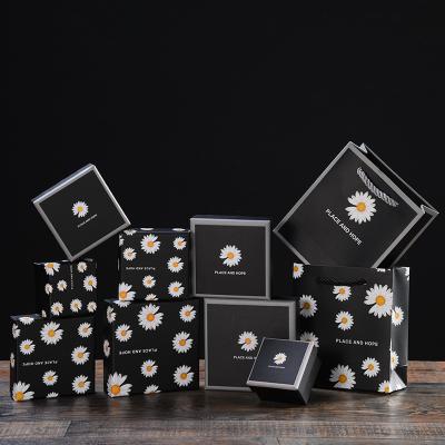 China 2021 Hot Selling Materials Small Daisy Ornaments Packing Box Gift Reused Earring Ring Jewelry Box for sale