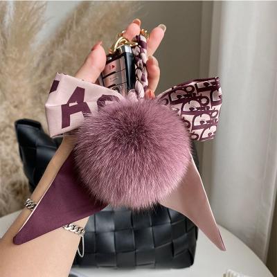 China Hot Cute Leather Luxury Designer Key Chains Key Rings Fashion Bow Tassel Fashion Key Chains Sale Key Chain for sale