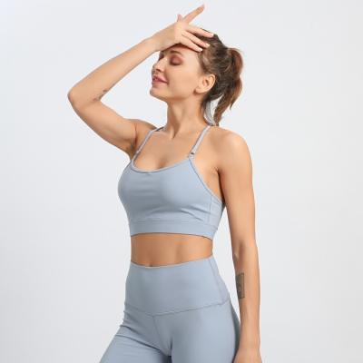 China Breathable Fashionable Sexy Women's Unique Yoga Bra Fitness And Sports Wear Workout Jogging Seamless Yoga Top for sale