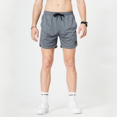 China 2021 new Anti-wrinkle fashion beach shorts for men solid color mens shorts plus size summer gym mens custom made shorts for sale