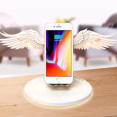 China 2022 Wireless Mobile Charger OEM Angel Wings Wireless Charger Qi 10w Fast Wireless Charger for sale