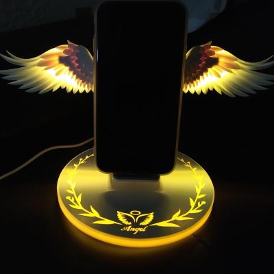 China 2022 Hot Sale OEM Mobile Wireless Charger Stand Fast Magnetic Angel Angel Wings Wireless Charger 10w Universal Qi Wireless Charger for sale