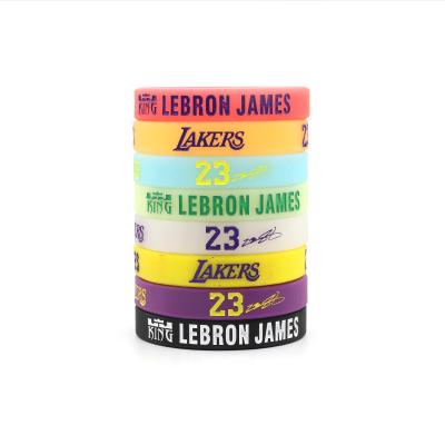 China New design decoration style silicone wristband men woman minimalist road to dreamy bracelets charm basketball sport wristband for sale