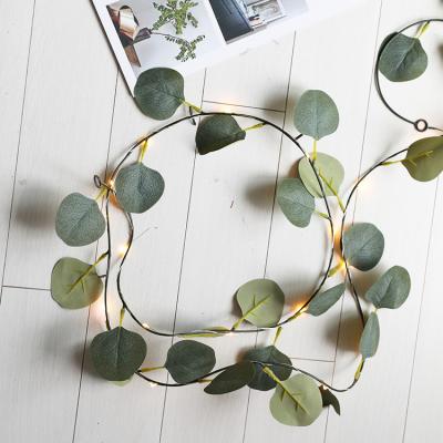 China LANDSCAPE led rattan lights room decoration maple leaf green vine copper wire lights eucalyptus vine lights battery box string l for sale