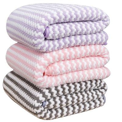 Chine Coral Velvet Striped Bath Towel Disposable High Density Absorbent And Quick-Drying Couples Bath Towel For Bathroom à vendre