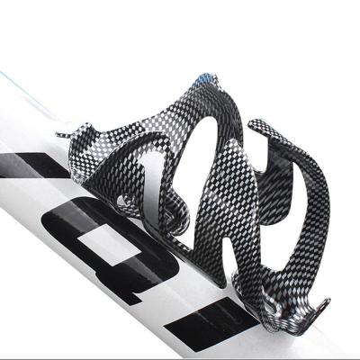 China Lightweight Bike Bottle Cage, Carbon Pattern Bottle Cage, Water Bottle Holder Sport Cage Bracket Bicycle Accessories Bottle Recycling Stake for sale