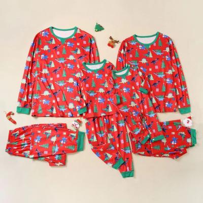 China Breathable Parent Kid Christmas Printed Lovely Pajamas Set Dinosaur Holiday Family Matching Outfits Long Sleeves Cotton Homewear for sale