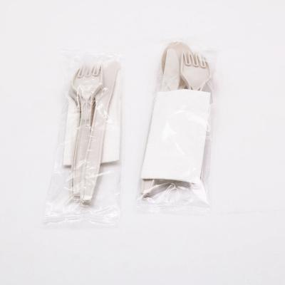 China Eco Friendly Disposable Cornstarch CPLA Biodegradable Cutlery With Eco Friendly Napkin for sale