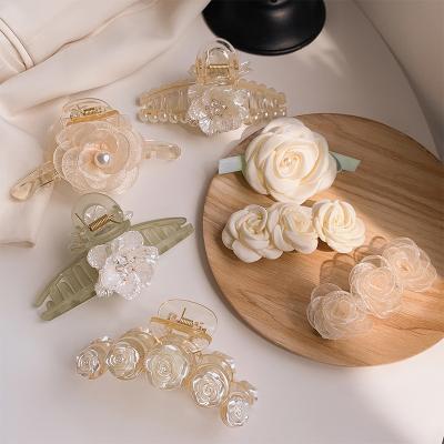 China Fashion European and American Korean temperament style soft hair claw accessories flower geometry large plastic hair clip claw for women for sale