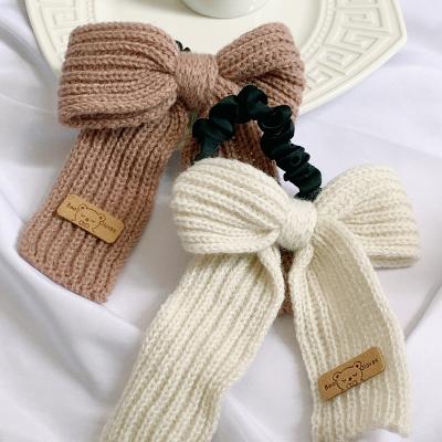 China New Big Korean Style Autumn And Winter Wool Braided Bow Hair Tie Girl Friendly Material Keep Warm Knit Stylish Temperament Bow Hair Claw Clip for sale