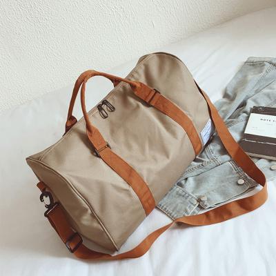 China Water Resistant Travel Duffel Bag Large Capacity Durable 900D Polyester Duffle Sports Bag With Shoes Compartment for sale